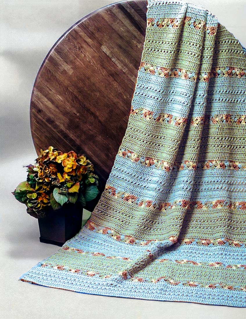 Motif afghan de fleurs en grappe