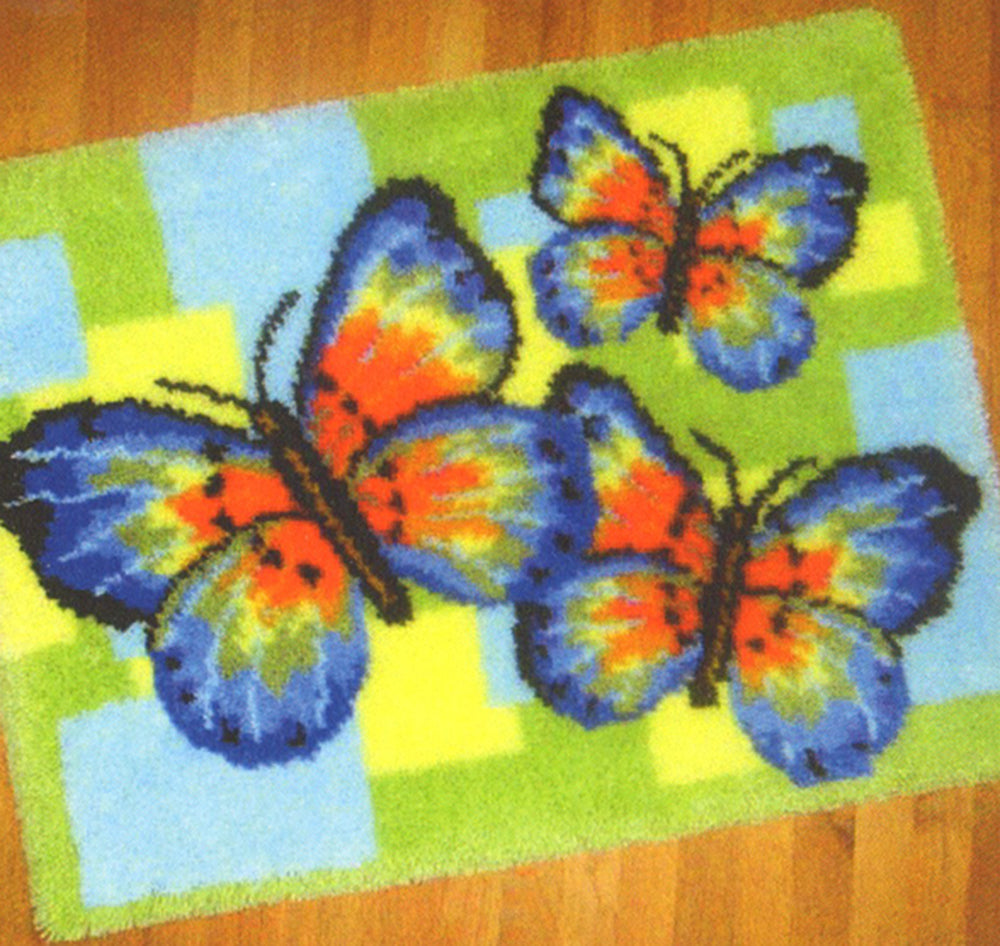 Motif de tapis trio de papillons
