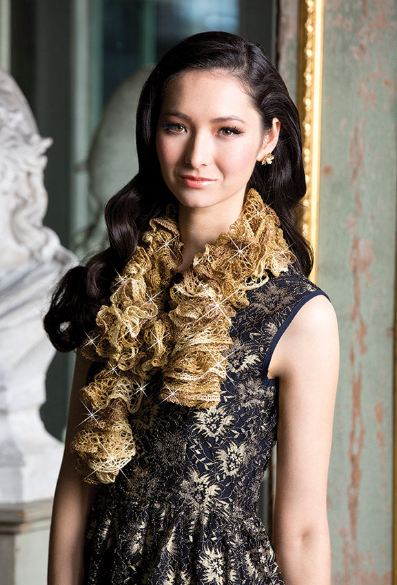 Modèle d'écharpe à tourbillons métalliques en tricot gratuit